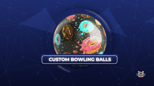 Personalized bowling ball with a vibrant donut pattern on a bowling lane, featuring the ExpertBowler logo.